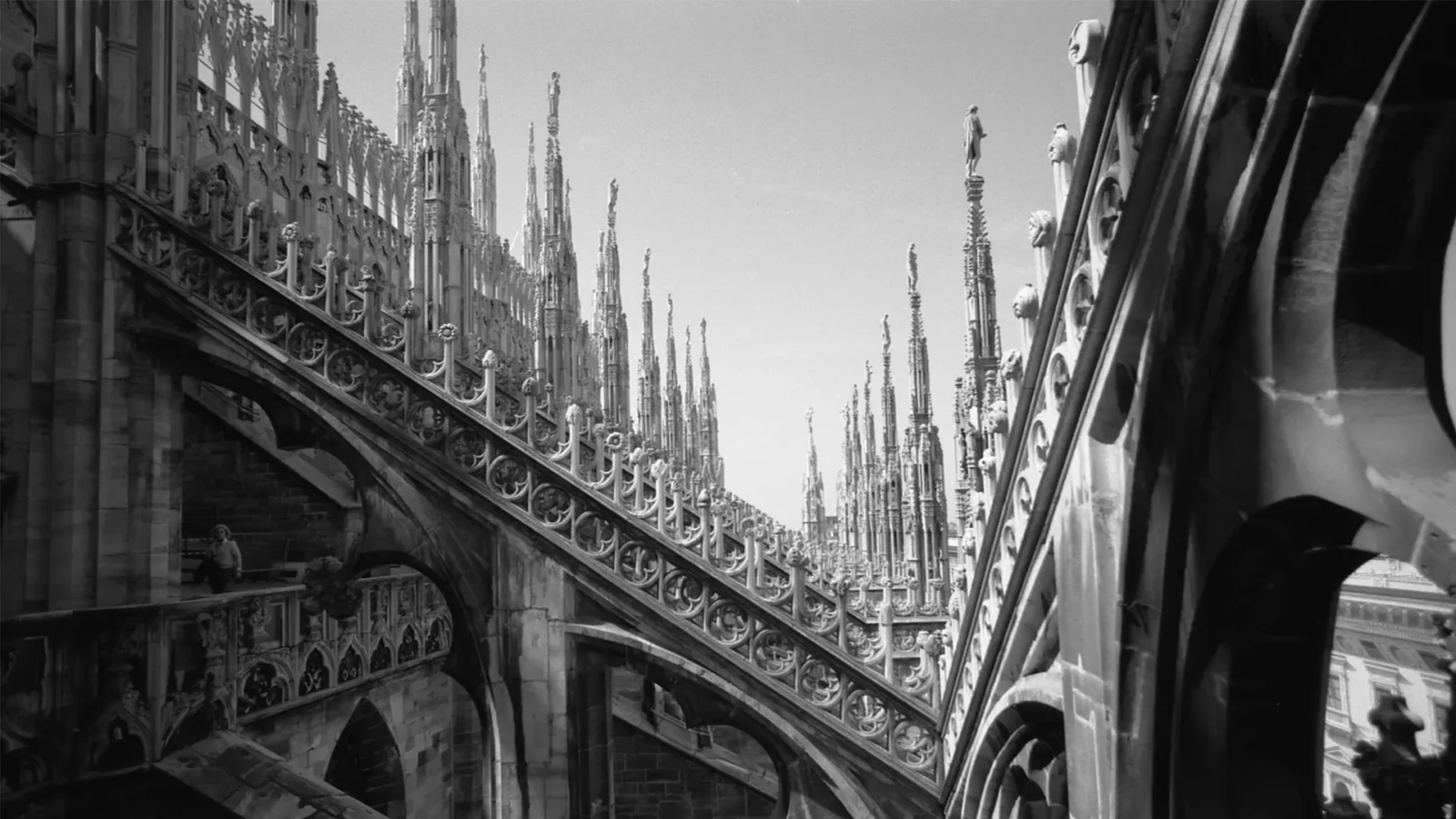A black and white photo of the roof of the Duomo di Milano cathedral in Milan, Italy.