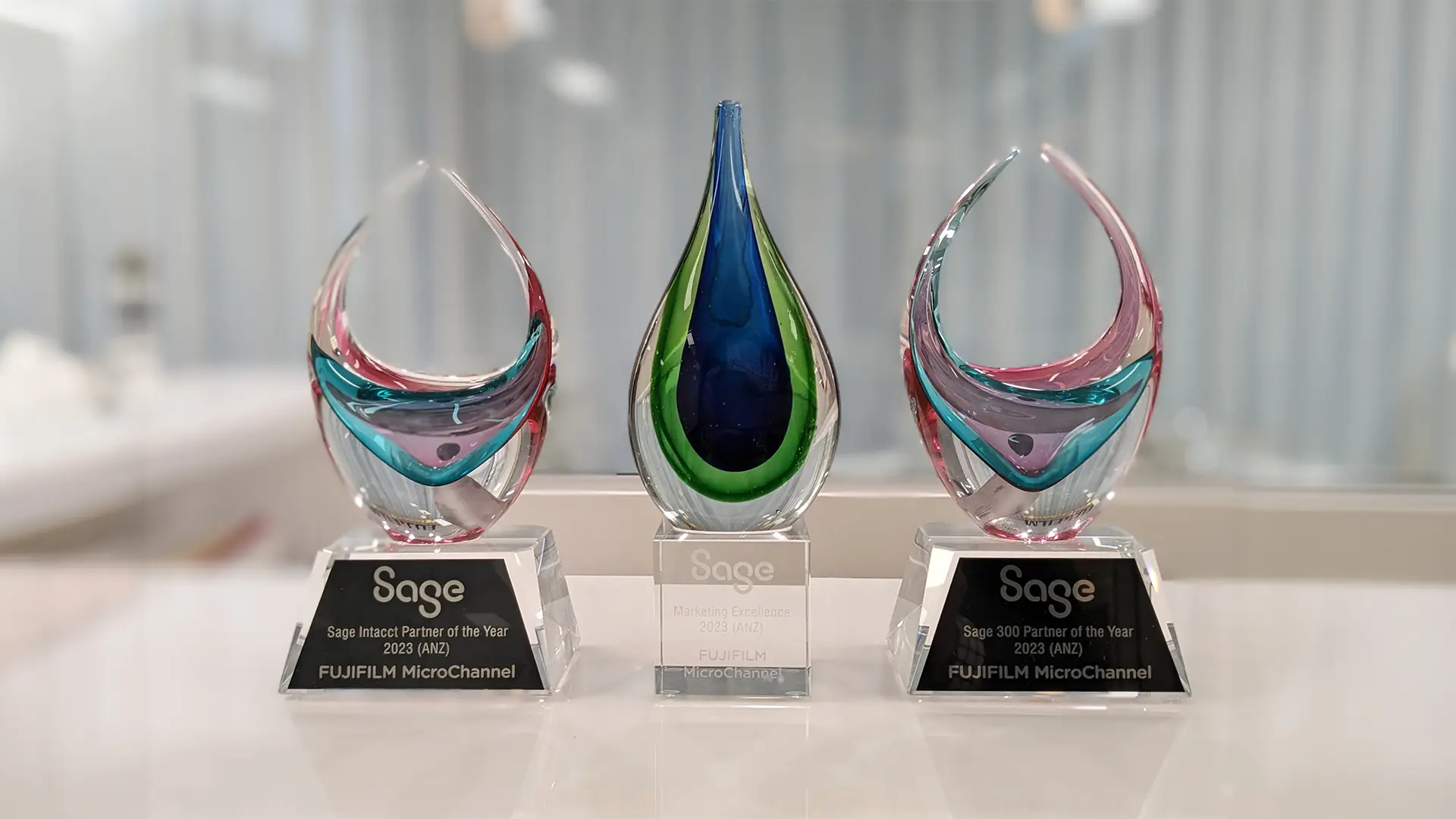 Three trophies presented to FUJIFILM MicroChanel from Sage